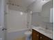 This bathroom features a shower over tub, single vanity, and towel racks at 14538 Baldwin Ln, Carmel, IN 46032