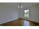Dining room with hardwood floors and chandelier at 14538 Baldwin Ln, Carmel, IN 46032