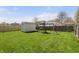 The backyard is equipped with a playground and storage shed, providing ample space for both recreation and storage at 14953 Lovely Dove Ln, Noblesville, IN 46060