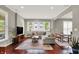 Bright and airy living room with hardwood floors, neutral paint, and natural light at 1826 N Alabama St, Indianapolis, IN 46202