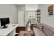 Bright office area with modern desk, comfortable seating, and stylish rug at 1826 N Alabama St, Indianapolis, IN 46202