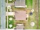 Birds eye view of backyard featuring a deck, patio, and trampoline in a neighborhood with well-manicured lawns at 1839 Silverton Dr, Avon, IN 46123