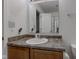 Bathroom with a single sink, vinyl floor, mirror, toilet, and shower at 1839 Silverton Dr, Avon, IN 46123