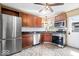 Well-equipped kitchen with stainless steel appliances, ample cabinet space, and modern backsplash at 1933 Ruth Dr, Indianapolis, IN 46240