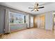 Open living room with wood-look floors, plenty of light, and direct entry to the front door at 1933 Ruth Dr, Indianapolis, IN 46240