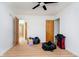 Bedroom featuring laminate floors and closet, creating a serene and uncluttered living space at 217 S 17Th Ave, Beech Grove, IN 46107