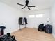 Bright bedroom with laminate floors, closet, and two windows, providing a comfortable, well-lit space at 217 S 17Th Ave, Beech Grove, IN 46107