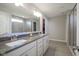 Bathroom featuring a double vanity with sinks and a spacious glass enclosed shower at 2237 S Copperstone Dr, New Palestine, IN 46163