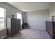 Bedroom with two large dressers flanking a chair and good natural light at 2237 S Copperstone Dr, New Palestine, IN 46163