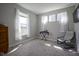 Bedroom with a neutral color palette, two windows, and carpeted floor at 2237 S Copperstone Dr, New Palestine, IN 46163