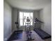 Functional exercise room with ample space for various workout equipment and natural light at 2237 S Copperstone Dr, New Palestine, IN 46163