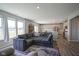 Spacious open-concept living area connecting the living room, dining area, and kitchen at 2237 S Copperstone Dr, New Palestine, IN 46163