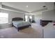 Spacious primary bedroom suite featuring tray ceilings and natural light at 2237 S Copperstone Dr, New Palestine, IN 46163