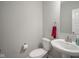 Powder room with pedestal sink and neutral gray walls at 2237 S Copperstone Dr, New Palestine, IN 46163