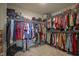 Walk in closet with fully customizable rack and shelving system, providing organized storage at 2237 S Copperstone Dr, New Palestine, IN 46163