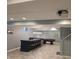 Finished basement with a bar, pool table, modern lighting, and a drop-down projector at 2325 Silver Rose Dr, Avon, IN 46123