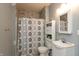 Bathroom with a combination shower and tub, a gray tile backsplash, and a white vanity at 2325 Silver Rose Dr, Avon, IN 46123