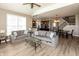 Open concept living room with an island kitchen and dining area at 2325 Silver Rose Dr, Avon, IN 46123