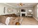 Inviting living room with a cozy fireplace and comfortable brown sectional sofa at 2325 Silver Rose Dr, Avon, IN 46123