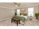 Comfortable main bedroom with carpet, a ceiling fan, and natural lighting at 2325 Silver Rose Dr, Avon, IN 46123