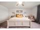 Inviting main bedroom featuring soft carpet, natural light, and a comfortable king bed at 2681 Pumpkin Patch Ln, Indianapolis, IN 46229