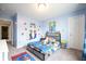 Bright, playful bedroom featuring fun Mario-themed decor, perfect for a or video game enthusiast at 2681 Pumpkin Patch Ln, Indianapolis, IN 46229