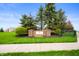 Attractive community sign for Autumn Woods set amongst mature trees and landscaping at 2681 Pumpkin Patch Ln, Indianapolis, IN 46229