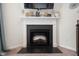 Stylish fireplace with a white mantel and decorative accents, adding warmth to the living space at 2681 Pumpkin Patch Ln, Indianapolis, IN 46229