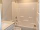 Bathroom with shower over tub and white countertop sink at 2704 Grassy Br Dr, Whitestown, IN 46075