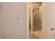 Partial view of bathroom with a shower and a glass door at 2704 Grassy Br Dr, Whitestown, IN 46075