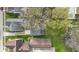 This is an aerial view of a backyard, detached garage, and residential neighborhood at 304 W 4Th St, Greenfield, IN 46140