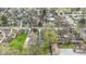 An aerial view of a residential neighborhood with tree-lined streets and varied home styles at 304 W 4Th St, Greenfield, IN 46140