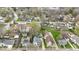 An aerial view of a residential neighborhood with mature trees and diverse home architecture at 304 W 4Th St, Greenfield, IN 46140