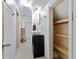 Bathroom with pedestal sink, shower and linen closet at 304 W 4Th St, Greenfield, IN 46140