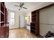 Bright bedroom features built in shelving, closet space and vanity with mirror at 304 W 4Th St, Greenfield, IN 46140