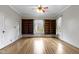 Spacious living room featuring hardwood floors, classic built-in bookshelves, and natural light at 304 W 4Th St, Greenfield, IN 46140