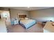 Spacious bedroom includes a queen bed, side tables, and ample space for dressers and storage at 3117 Allesley Way, Westfield, IN 46074