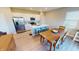 Modern kitchen features stainless steel appliances, white cabinets, and an island with barstool seating at 3117 Allesley Way, Westfield, IN 46074