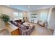 Spacious living room filled with natural light has modern finishes perfect for relaxing and entertaining guests at 3117 Allesley Way, Westfield, IN 46074