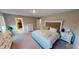 Relaxing bedroom features an ensuite bathroom, walk-in closet, and cozy carpet at 3117 Allesley Way, Westfield, IN 46074