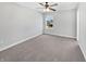 Bedroom features carpeted floor, neutral walls, and a window with a view at 3278 Jasper Ln, Brownsburg, IN 46112