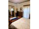 Bedroom with a large dresser, mirror and wood chest at the end of the bed at 3559 N Us Highway 41, Bloomingdale, IN 47832