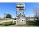 Peaceful Waters Camp sign offers cabins for rent, bait, tackle, firewood, and fond memories at 3559 N Us Highway 41, Bloomingdale, IN 47832
