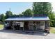 Exterior of the camp store features a gift shop, snacks, tackle, and a cozy atmosphere at 3559 N Us Highway 41, Bloomingdale, IN 47832