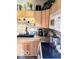 Kitchen featuring natural wood cabinets, tiled backsplash, and stainless steel appliances at 3559 N Us Highway 41, Bloomingdale, IN 47832
