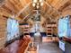 Open-concept cabin interior featuring wood paneling and bunk beds at 3559 N Us Highway 41, Bloomingdale, IN 47832