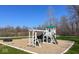 Outdoor playground with swings, slide, and playhouse overlooking the lake at 3559 N Us Highway 41, Bloomingdale, IN 47832