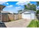 This home has a detached garage with an adjacent yard fenced for privacy at 3809 Wildwood Dr, Indianapolis, IN 46239