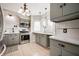 Modern kitchen with stainless steel appliances, stylish cabinetry, and ample counter space at 4102 N Illinois St, Indianapolis, IN 46208