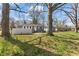 Large backyard with a white fence at 4159 Asbury St, Indianapolis, IN 46227